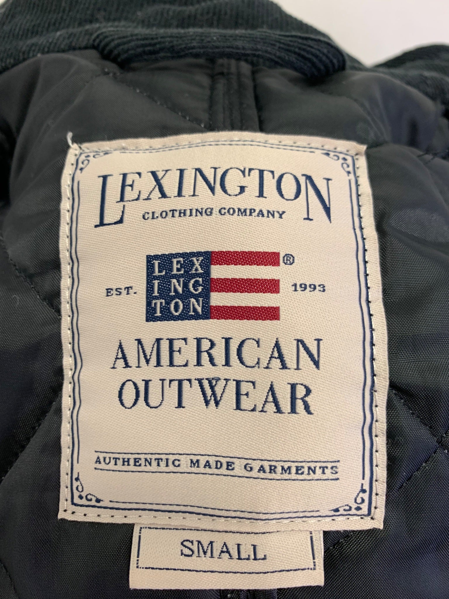 Marin blå quiltad jacka från Lexington i storlek S